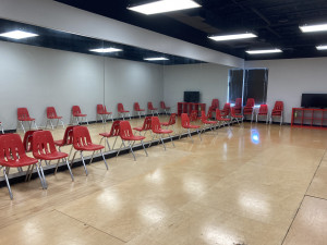 Rehearsal room with wooden floors and mirrors