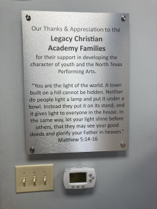 Metal sign recognizing sponsorship from Legacy Christian Academy Families