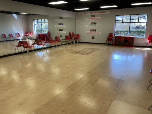 Rehearsal room with wooden floors and mirrors