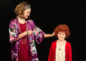 Young actresses play Annie and Miss Hannigan