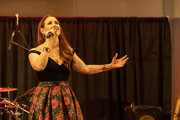 Jessie Booth performs a song at Celebration of Champions