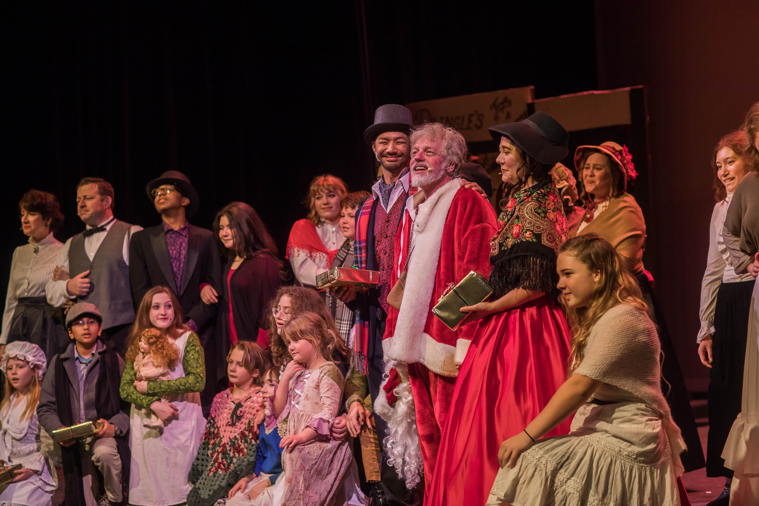 Darrell Rodenbaugh as Scrooge and the cast of Scrooge! the Musical performing the finale