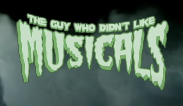 The Guy Who Didn't Like Musicals temporary logo