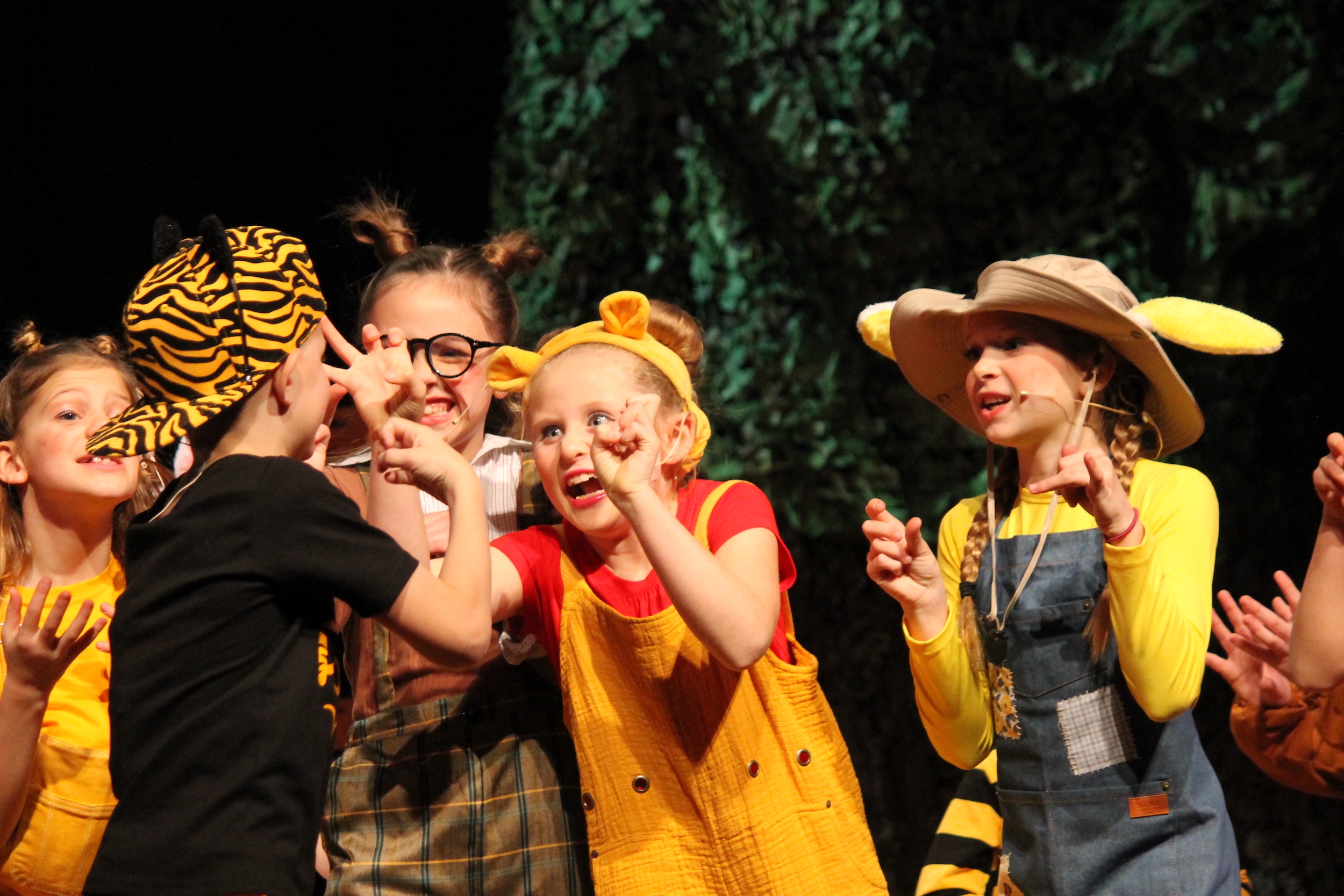 Young actors pretend to be animals in production of Winnie the Pooh