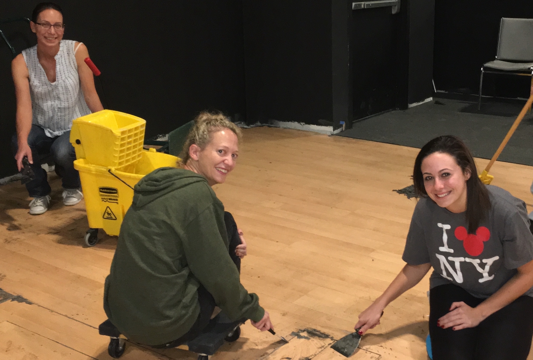 Volunteers repair the floor