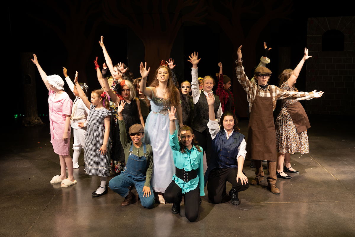 NTPA Dallas Actors hit a final pose with arms up during 2023 production of Into the Woods